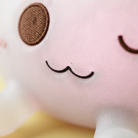 Dumplings Squishy Toy Vit XXL — närbild på strukturen