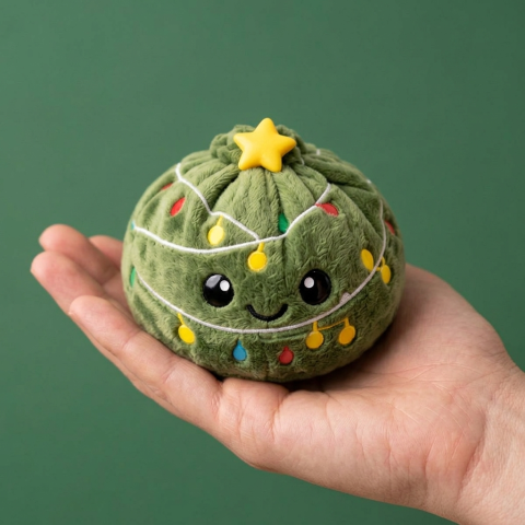 Dumpling Squishy Christmas Tree Glitter i handen, verklig storlek
