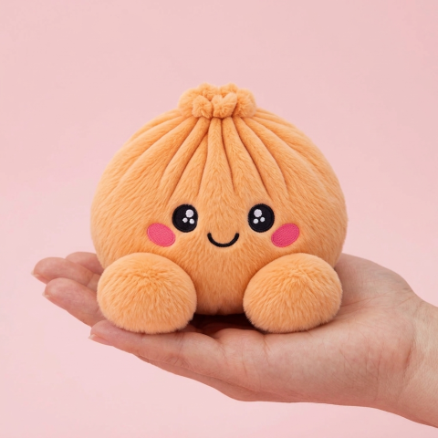 Squishy Dumpling Orange Mandarin i handen, verklig storlek